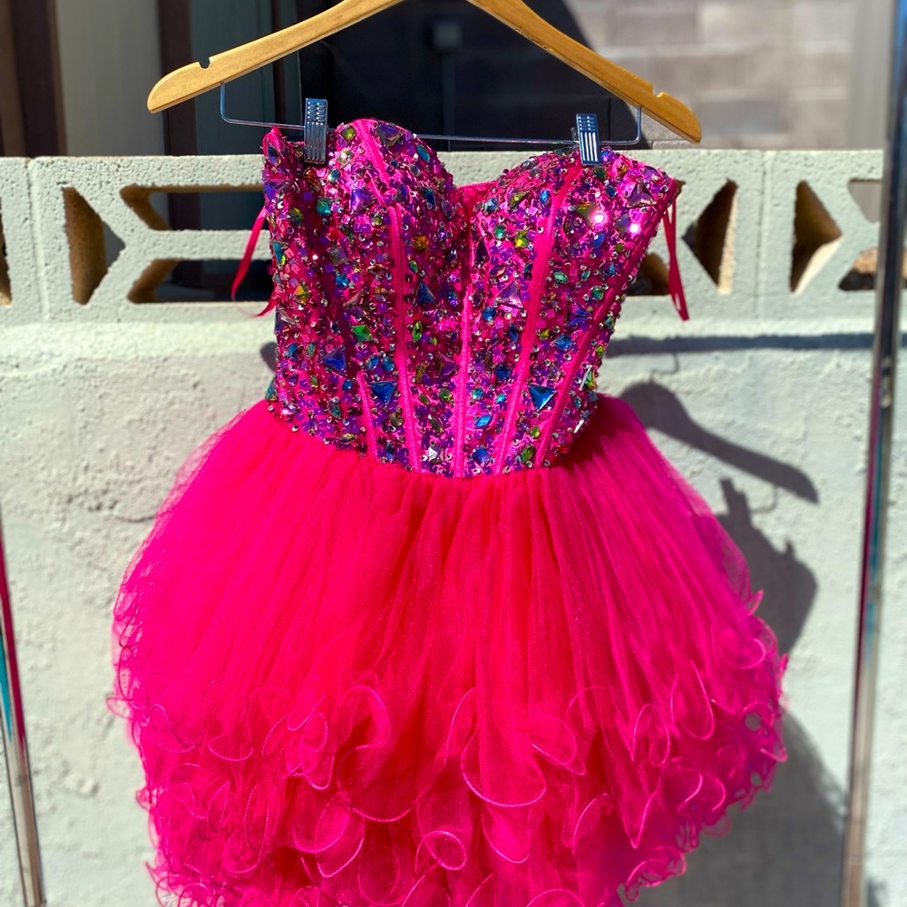 Strapless, short pink gown adorned w/rainbow crystals. Prom/homecoming.